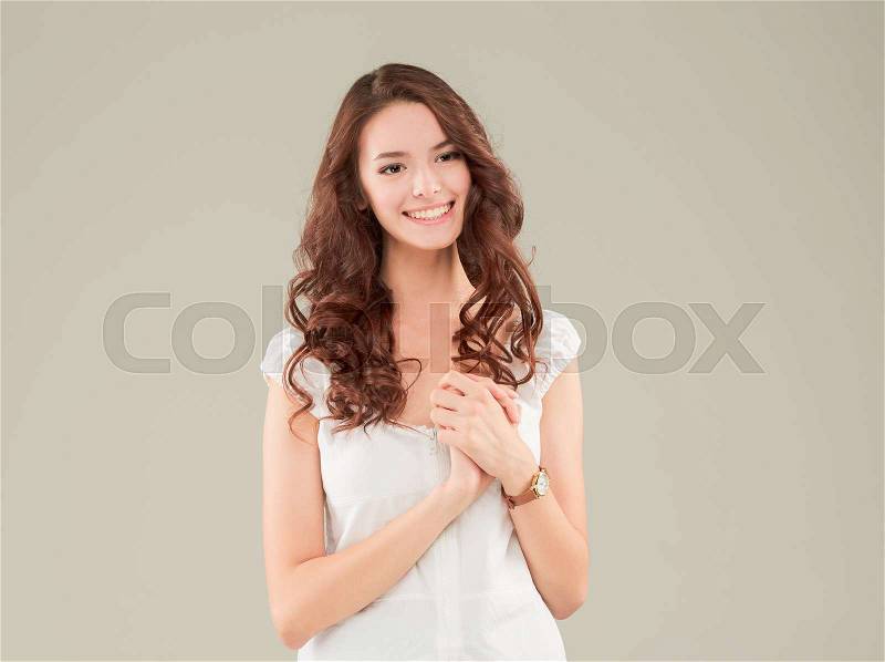 The young woman\'s studio portrait with happy emotions, stock photo