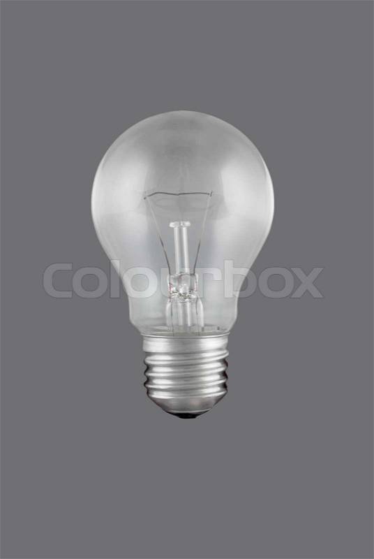 A light bulb isolated on a solid color background, stock photo