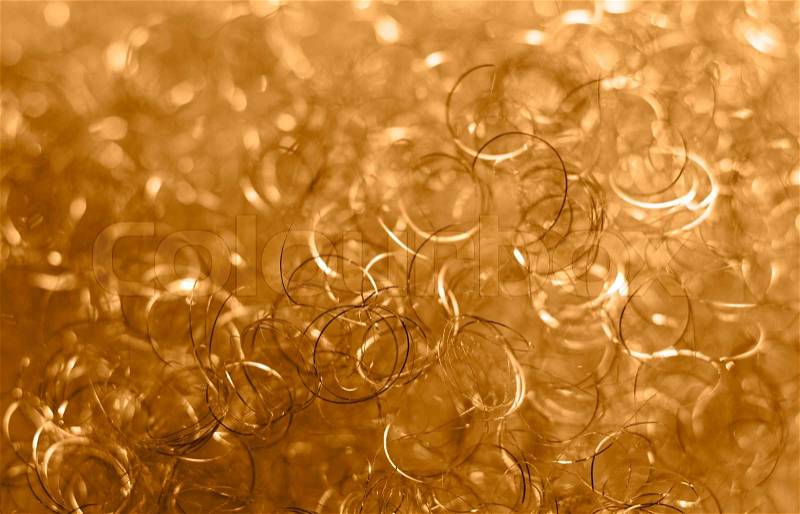 Abstract background with decorative golden metal loops, stock photo