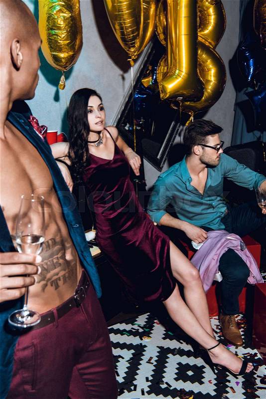 Stylish people on new year party and drinking champagne, stock photo