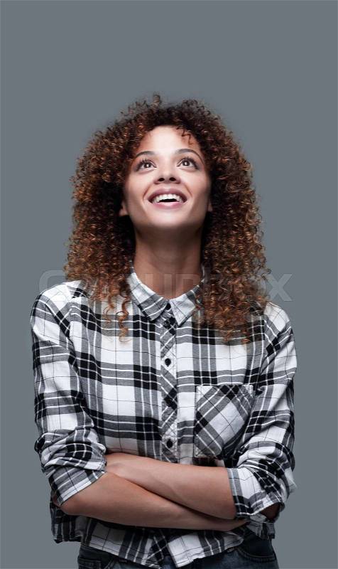 Portrait of a beautiful young woman in a plaid shirt. Beauty and fashion, stock photo