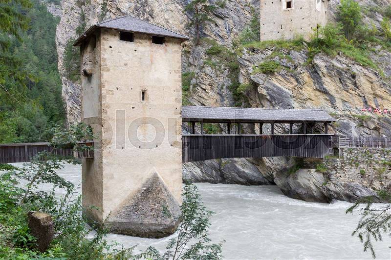 Medieval castle Altfinstermunz, in the valley of the Inn River, European Alps, near the village Nauders. The castle was built in 1472, stock photo