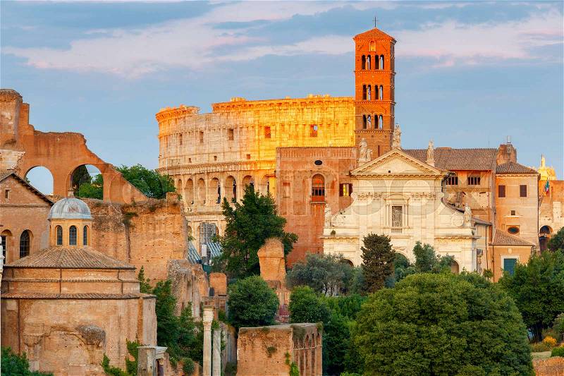 View of the Roman Forum and Colosseum in the golden hour. Rome. Italy, stock photo
