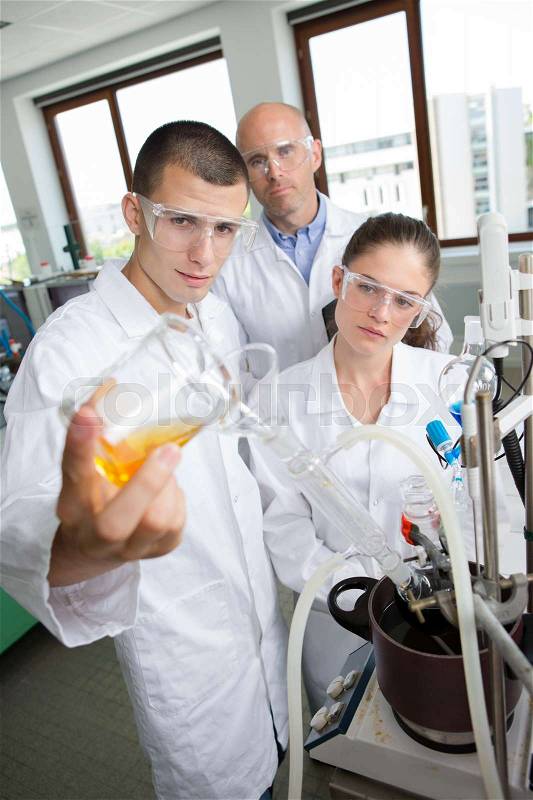 Engineering students working in the lab, stock photo