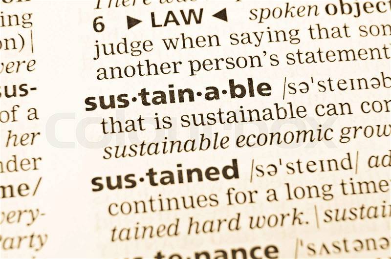 The word sustainable in the old dictionary Selective focus effect, stock photo