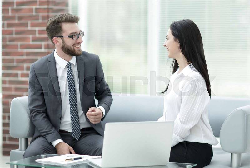 Employees of the company talking at the workplace. business concept, stock photo