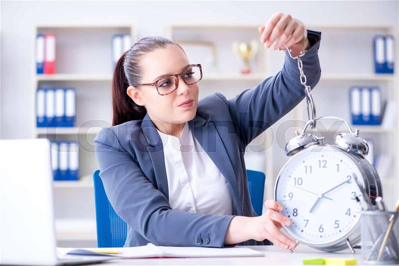 Businesswoman in time management concept , stock photo