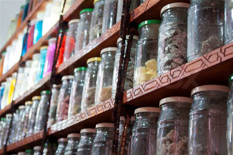 Jars of herbs and powders in a moroccan spice shop in the marrakech medina, Morocco, stock photo