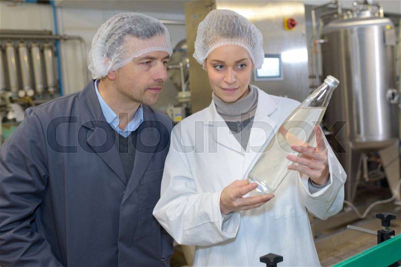 Water bottling line for processing pure mineral carbonated water, stock photo