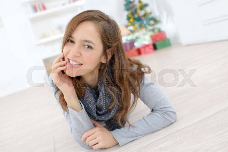 Woman laying on the floor, stock photo