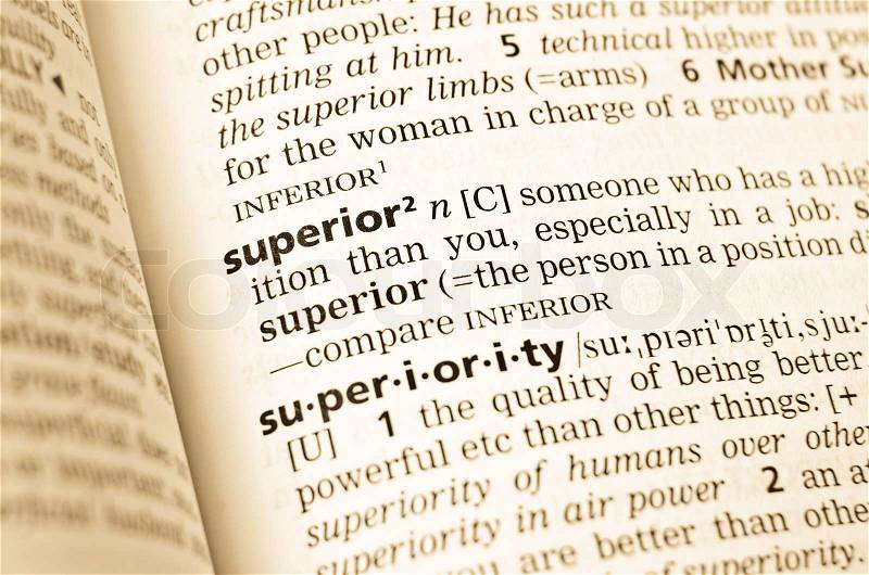 The word superior in the old dictionary Selective focus effect, stock photo