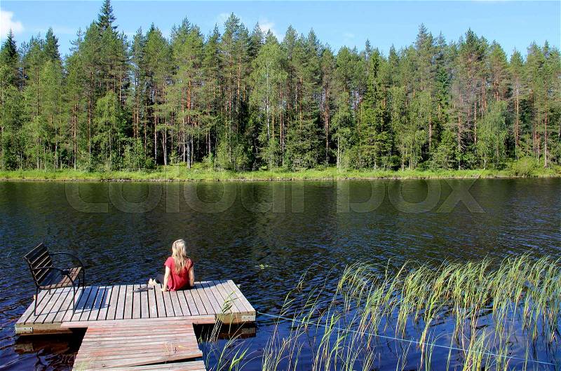 Young beautiful woman enjoy the nature of Finland, Karelia , stock photo