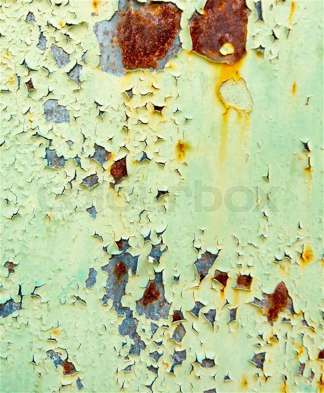 Old rusty metal painted with green paint as background , stock photo