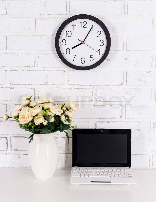 Workplace with modern laptop with blank screen at home or in office, stock photo
