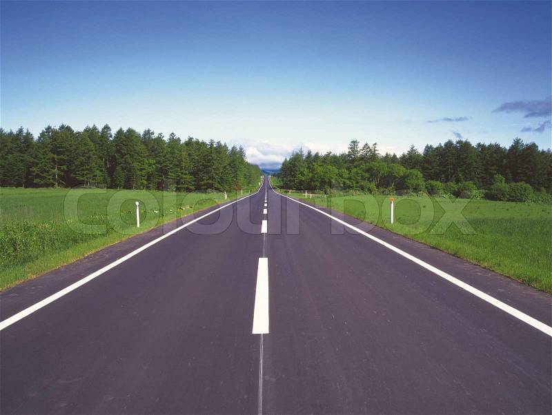 Empty curved road,blue sky and sun, stock photo