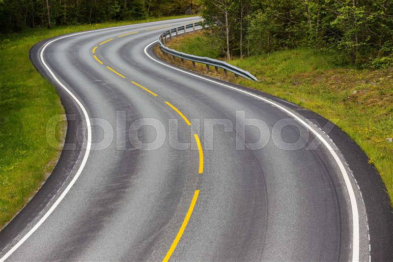 Beautiful windy road at the norwegian mountains , stock photo