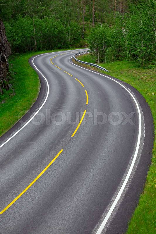 Beautiful windy road at the norwegian mountains , stock photo