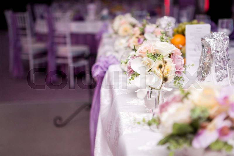 Beautiful Flower bouquet arrangement in the reception of the celebration hall, stock photo