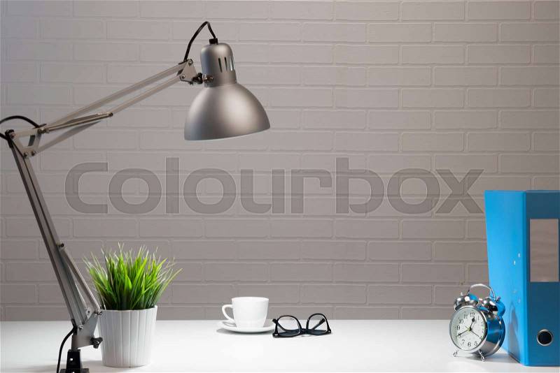 Empty white working table in fis at night, stock photo