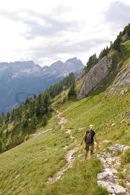 Female hiking in the alps, slovenia, stock photo