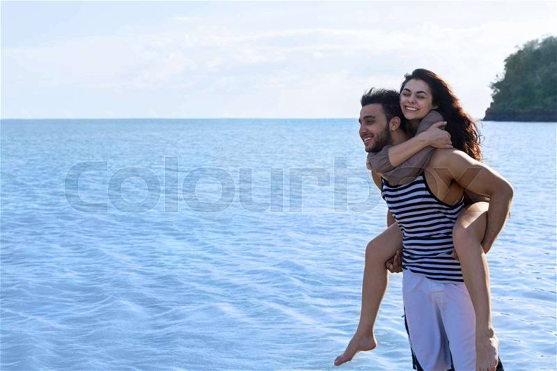 Couple Beach Summer Vacation, Man Carry Woman Beautiful Young Happy Man And Woman Smile Sea Ocean Holiday Travel, stock photo