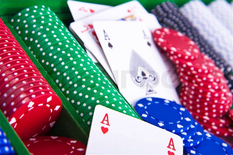 Colorful poker chips with ace card, stock photo
