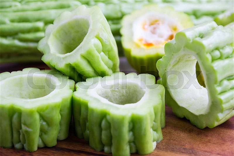 Fresh Green Bitter Cucumber Or Chinese Bitter Melon Or Melon Sliced In Pieces , stock photo