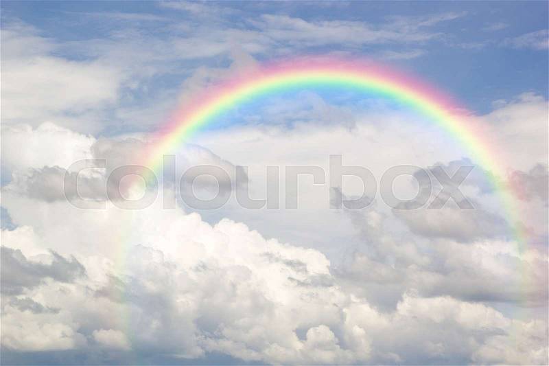 Beautiful Classic Rainbow Across In The Blue Sky After The Rain, Rainbow Is A Natural Phenomenon That Occurs After Rain, Rainbow Consists Of Purple, Indigo Blue, Blue, Green, Yellow, Orange And Red. , stock photo
