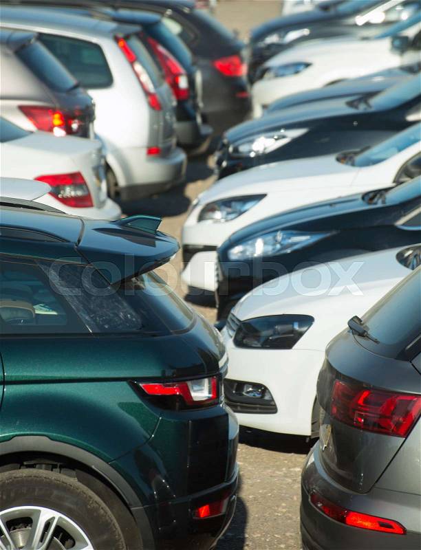 Lot of cars are parked in the parking lot, stock photo
