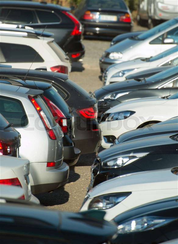 Lot of cars are parked in the parking lot, stock photo