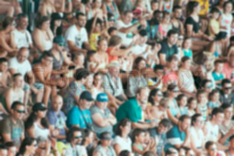 Blurred crowd of people on the stadium, stock photo