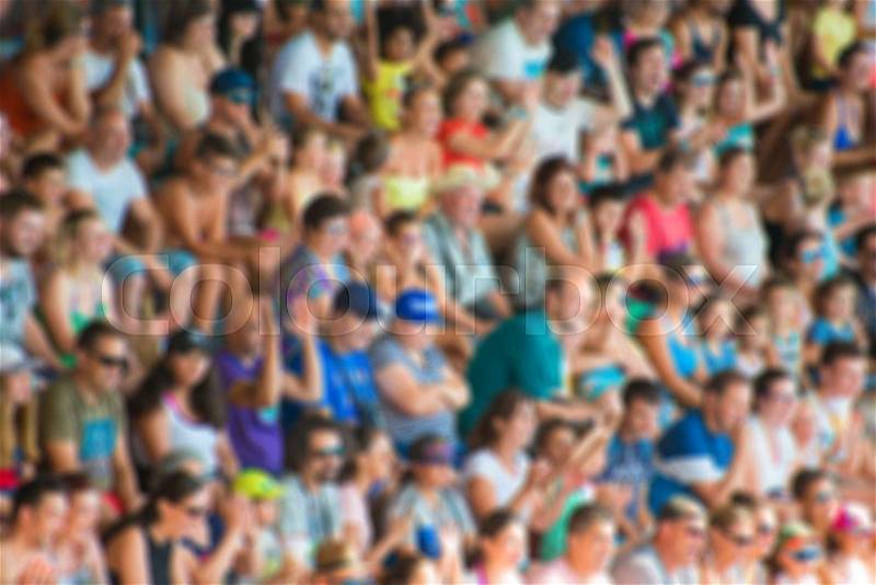 Blurred crowd of people on the stadium, stock photo