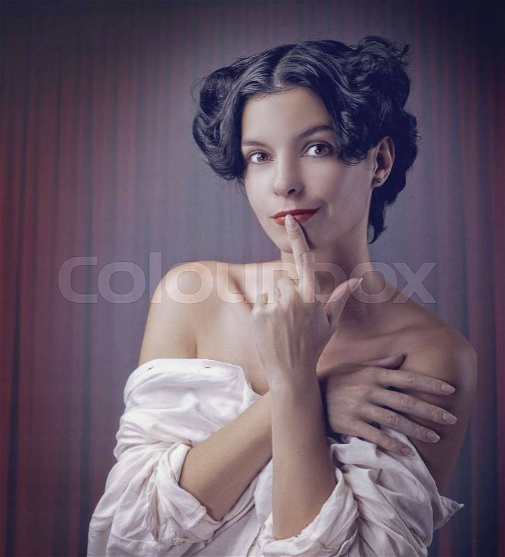 Sensuality. Beauty brunette, retro styled female portrait, stock photo