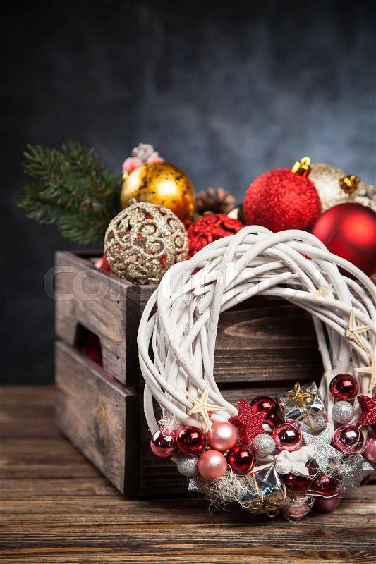 Christmas ornaments in a wooden crate, stock photo