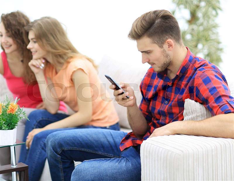 Group of young people resting on the couch in the living room. photo with copy space, stock photo