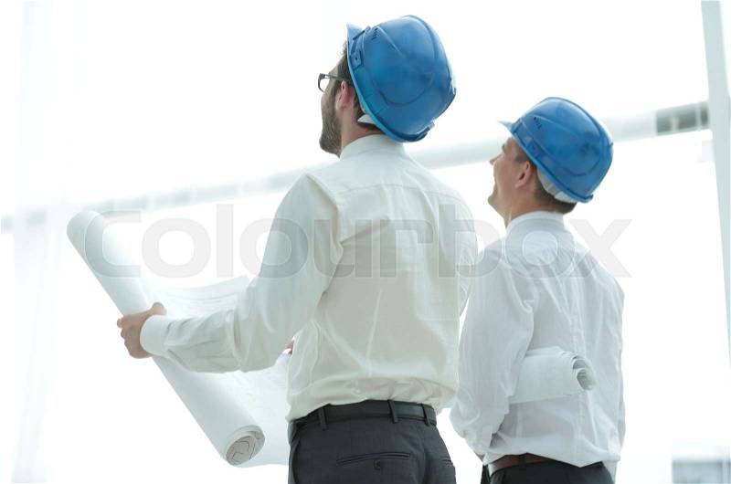 Business background.architect and Builder looking at blank screen, stock photo