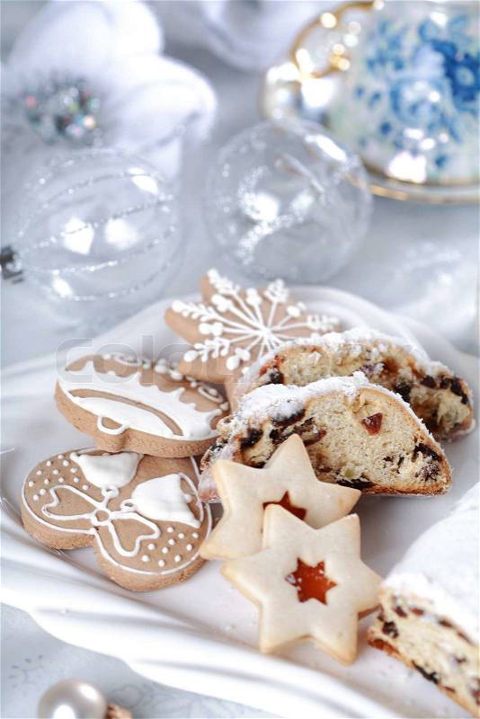 Still life with delicious Christmas cake and cookies, stock photo