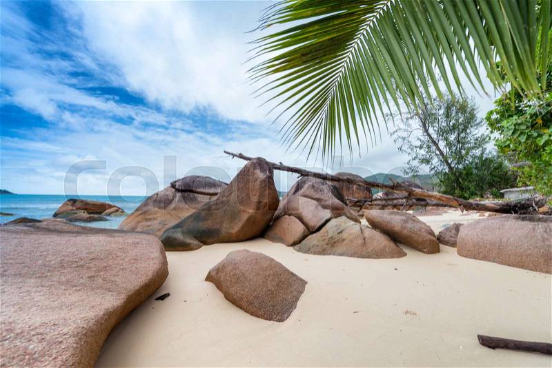 Beautiful rounded rocks of Anse Boudin - Praslin, Seychelles, stock photo