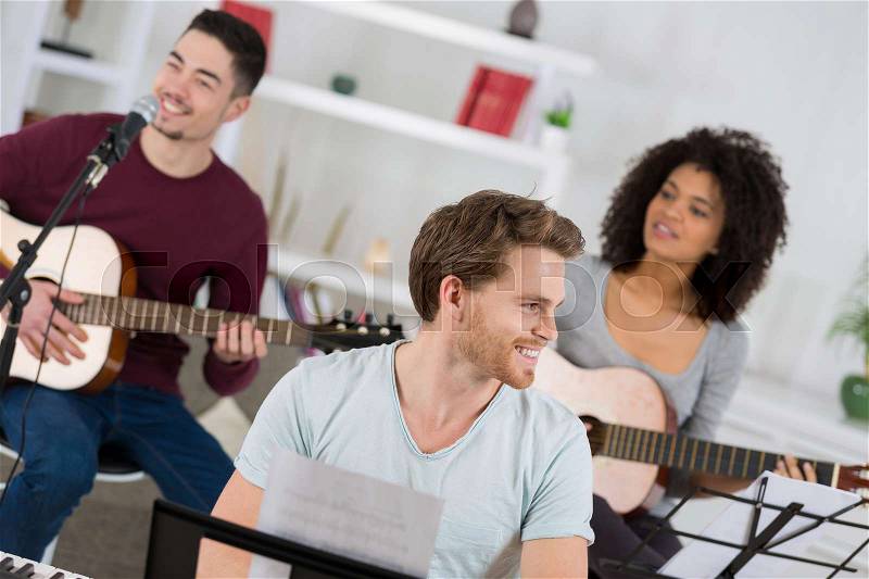 Band practice in the house, stock photo