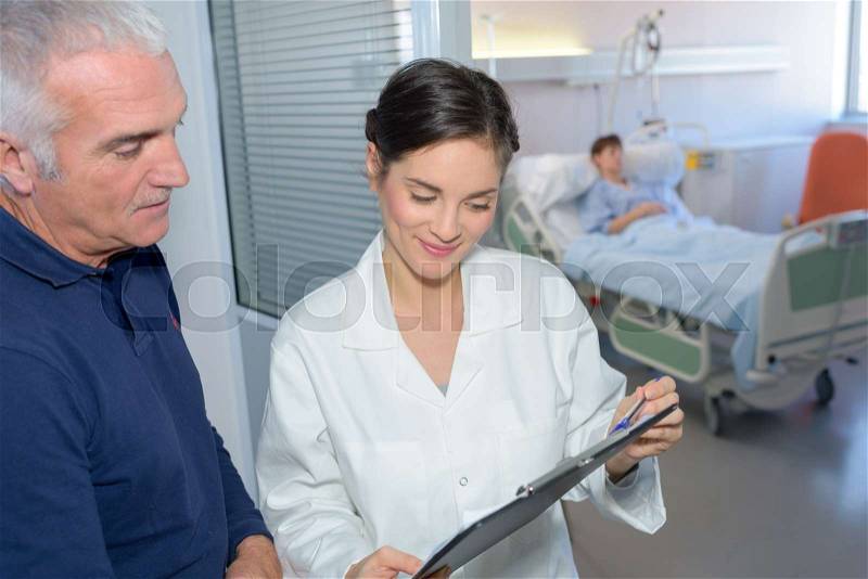 Giving the latest condition report, stock photo