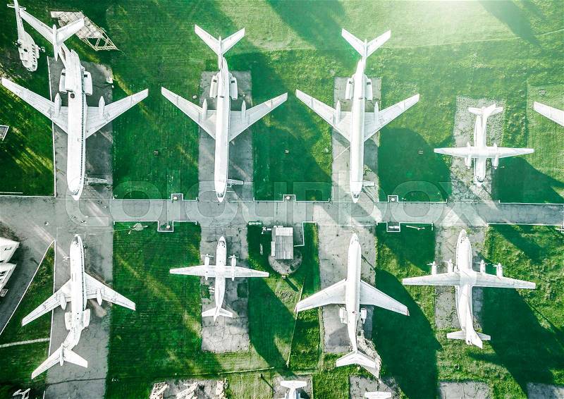 White planes on openair museum field, top view, stock photo