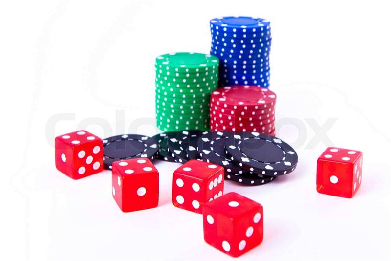 Poker chips and dice on white background, stock photo