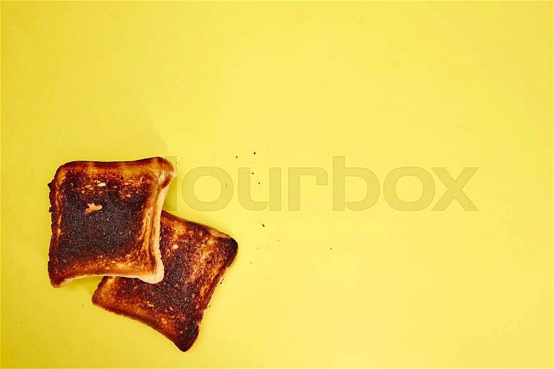 A studio photo of burnt toast, stock photo