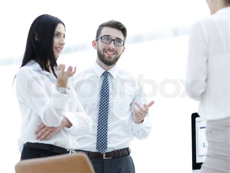 Company employees are talking in the office. photo with copy space, stock photo