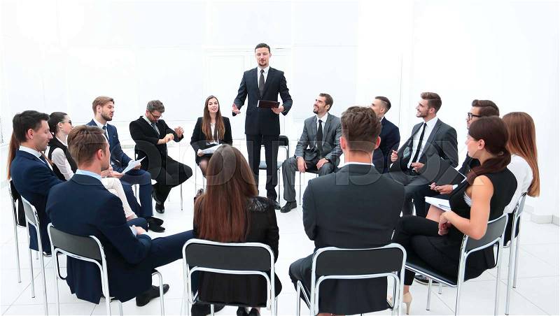 Coach leads the session with the business team. business and education, stock photo