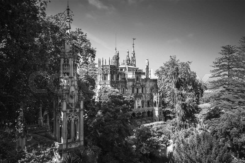 Romantic palace and chapel of Quinta da Regaleira located near in Sintra, Portugal. It was completed in 1910 and now is classified as a World Heritage Site by UNESCO. Black and white photo, stock photo