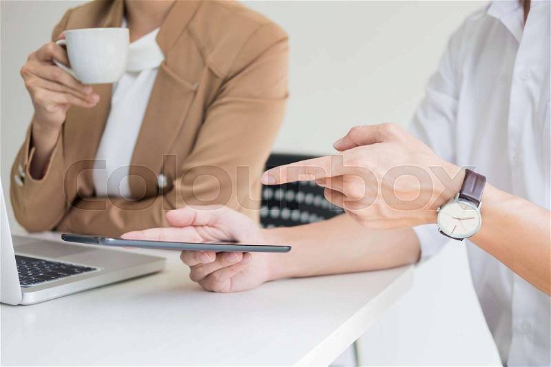 Team work process. young business managers crew working with new startup project. labtop on wood table, typing keyboard, texting message, analyze graph plans, stock photo