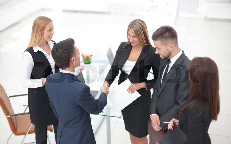 Handshake Manager and the client after signing the contract in the office.the business concept, stock photo
