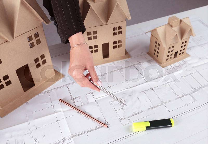 Image of new model house on architecture blueprint , stock photo