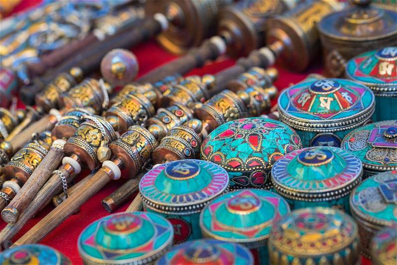 Tibetan praying objects for sale at a souvenir shop in Ladakh, India, stock photo